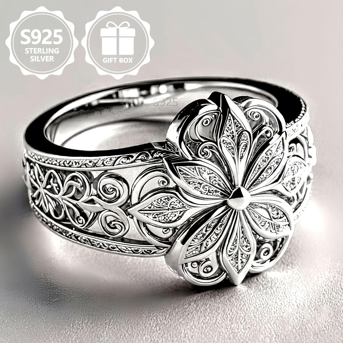 sterling silver vintage engraved ring with exquisite hollow design and silver-white floral carving Size 7