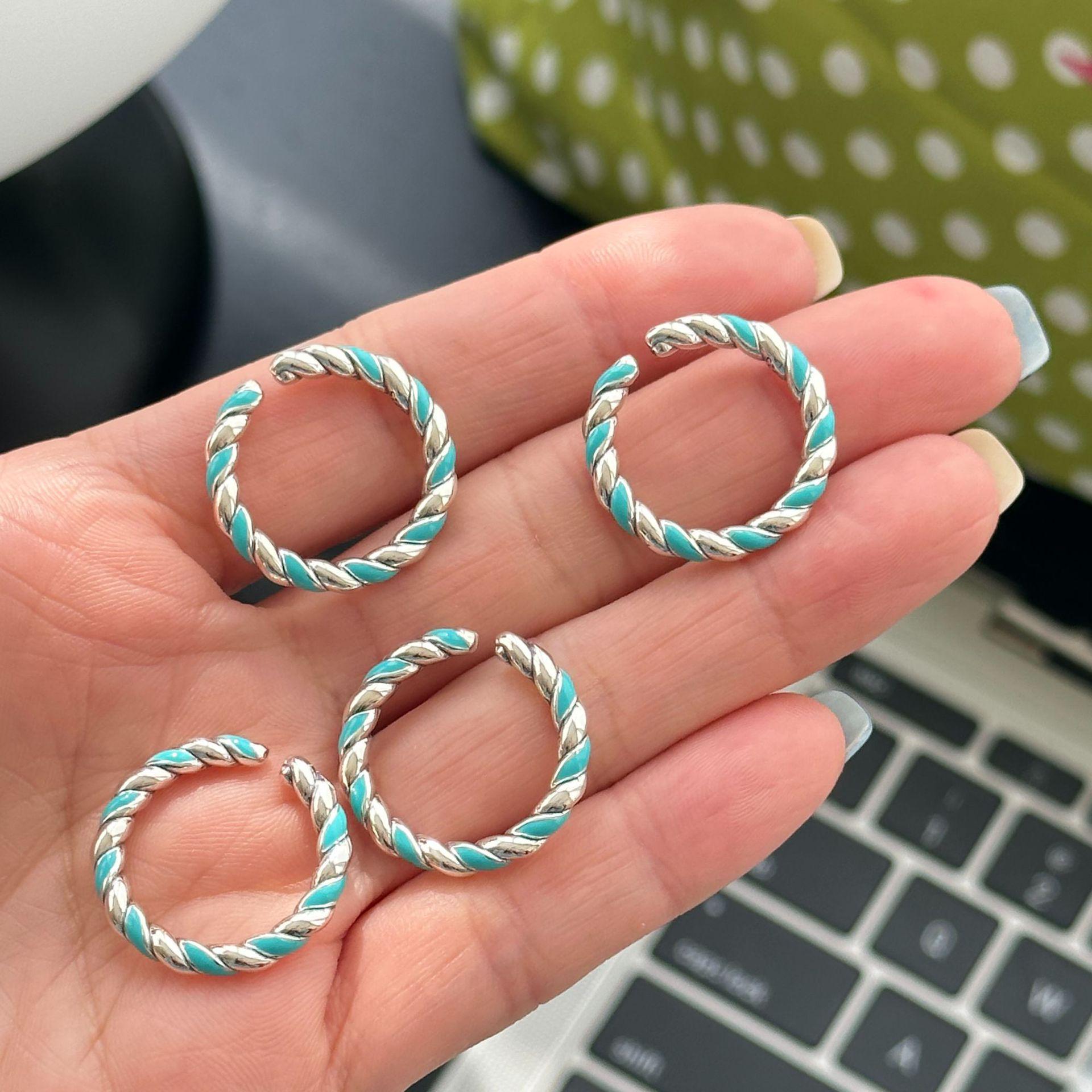 

Elegant Mobius Open Ring: Blue Drip Glaze, Versatile, Fashionable, Simple, Twisted Design for Women