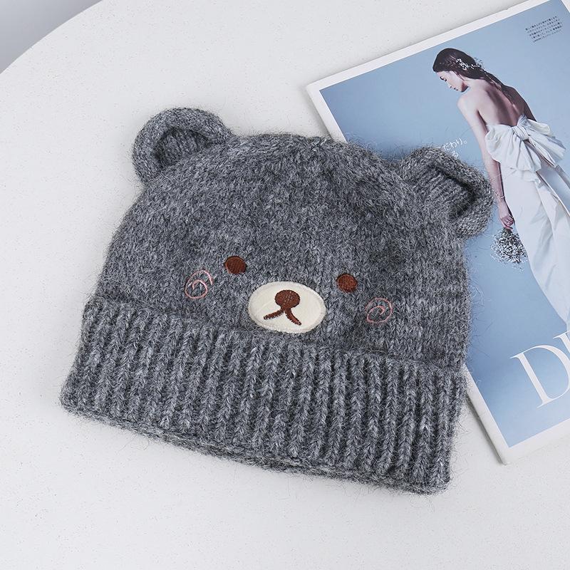 Source cute bear acrylic knitted wool hat, small face in autumn and winter, embroidered turned brim warm ear protection hat