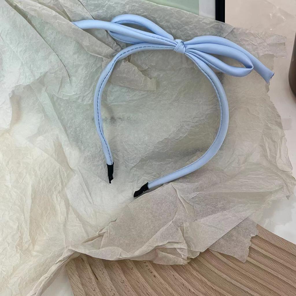 Søt hårklemme med sidesveis, sløyfehårbøyle, fasjonable hodeplagg, avslappet hodebekledning, holder hårstråene sikkert