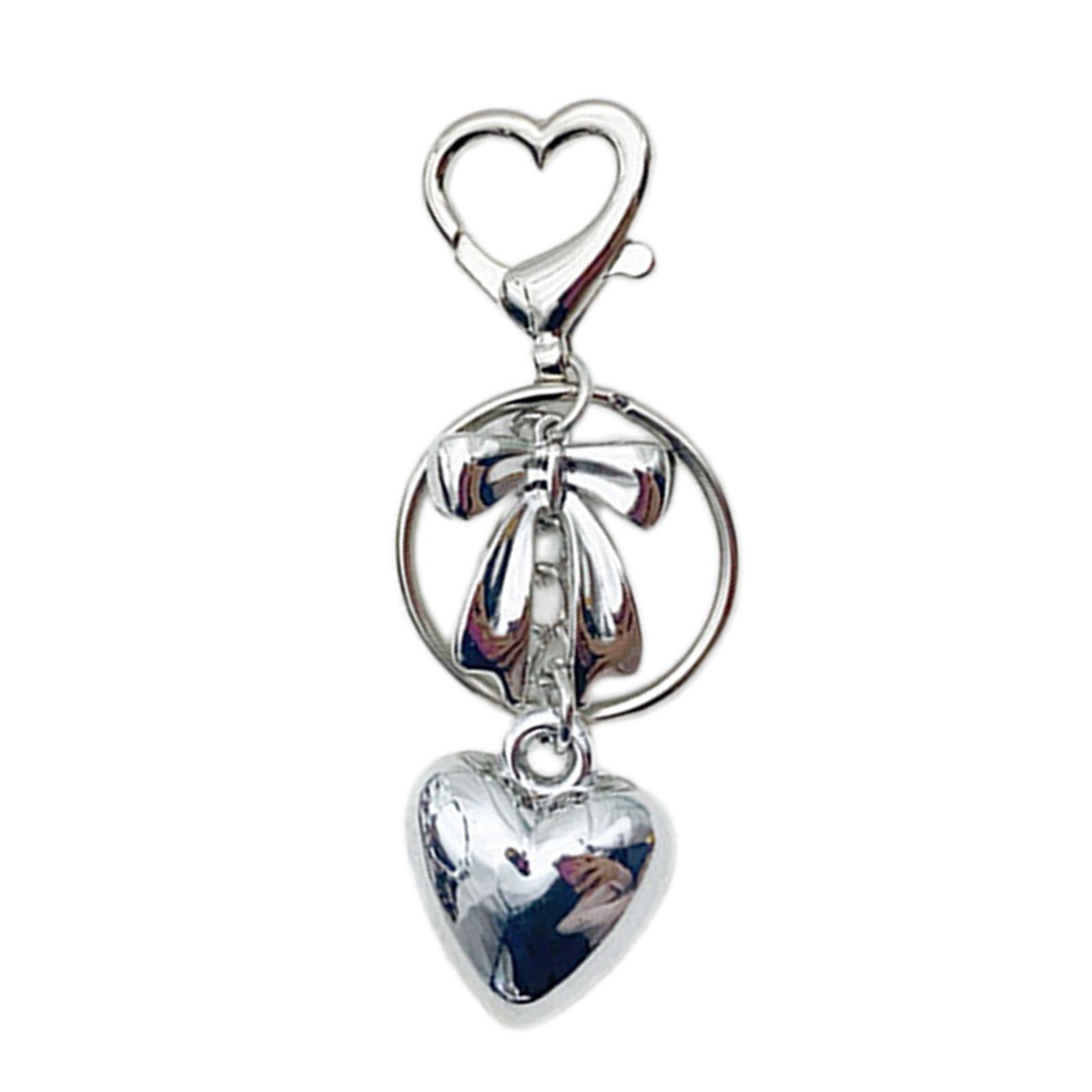 Элегантный кулон в виде сердца с бантом — фото 11