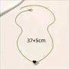 Europäische und amerikanische modische Damen-Halskette mit schwarzem Herz und einfacher Knochenkette als Accessoire