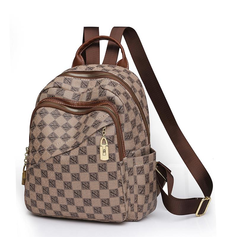 

Жіноча сумка через плече. Дорожня сумка з принтом. Жіночий шкіряний рюкзак хакі