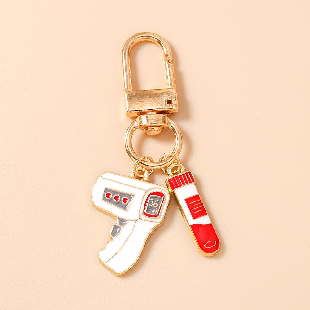 

New Enamel Doctor s Gown keychain Ambulance Key Ring Pendants for Women Girls Handbag Decor DIY Key Chain Jewelry Gifts