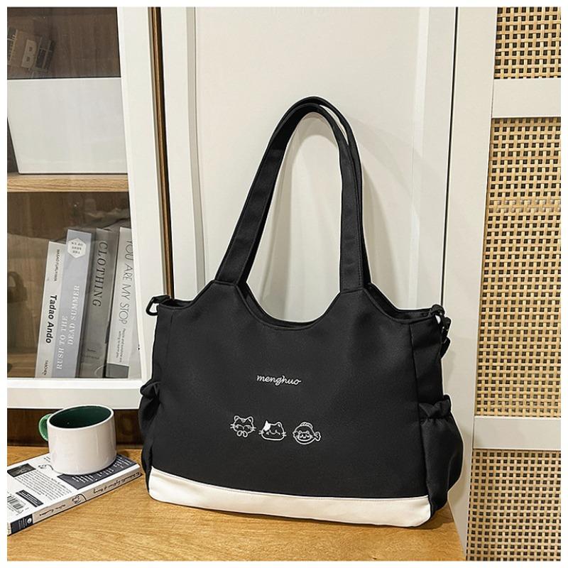 

Niche design solid color simple literary style tote bag women s new high value, light and versatile large capacity messenger bag