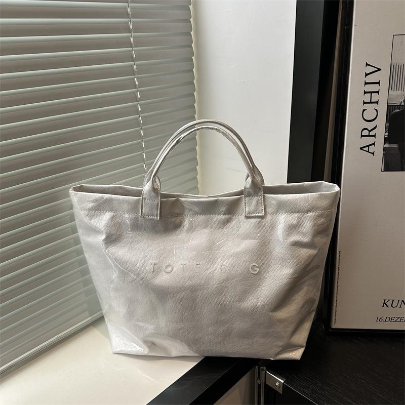 Large capacity DuPont paper jelly bag fashionable transparent pvc waterproof hand bag children kraft paper commuter hand