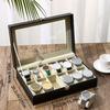 A Faux Leather Watch Storage Box That Holds 12 Watches, Perfect for Displaying Timepieces And Storing Jewelry Like Bracelets