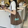Tasche mit Buchstabendruck Bequeme Kordelzugtasche Große Kapazität Lässige Tasche Weich Zum Ausgehen Kurze Ausflüge Reisen