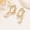 1Irregular geometric water drop imitation pearl zircon earrings are suitable for daily commuting and holiday parties