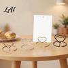 Name Card Stands 20Pcs Hollow Heart Table Number Holder Love Place Stand Shaped Metal Clip for Photos Food Signs Memo Notes Weddings Birthdays,