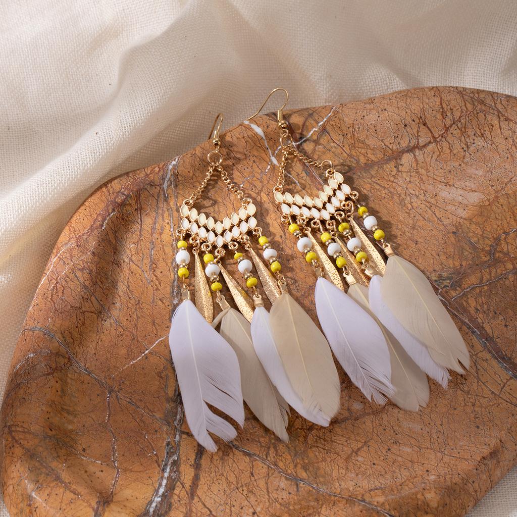 Retro ethnic style woven feathers long fringed earrings, bohemian high-end hollow rice bead earrings