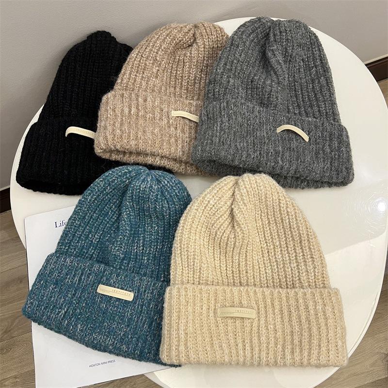 

Fashion Lazy Wind Large Version Cashmere Wool Hat Women s Winter Ear Protection Warm Curling Knitting Stacking Hat Tide M（56-58cm） синій