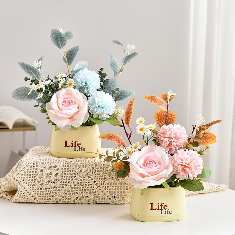 Living Room Decor: Artificial Sunflower and Green Plant Arrangements, Small Potted Plants, and Plastic Bouquets