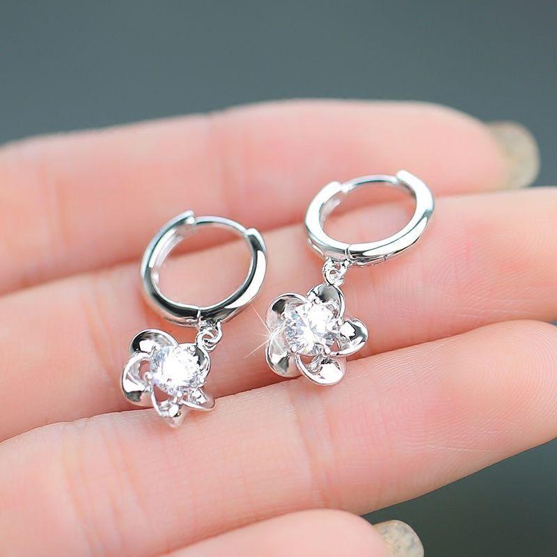 

S925 Sterling Silver Women s Japanese and Korean Plum Blossom round New Earrings Pair of Blossoms [White Zirconium]]