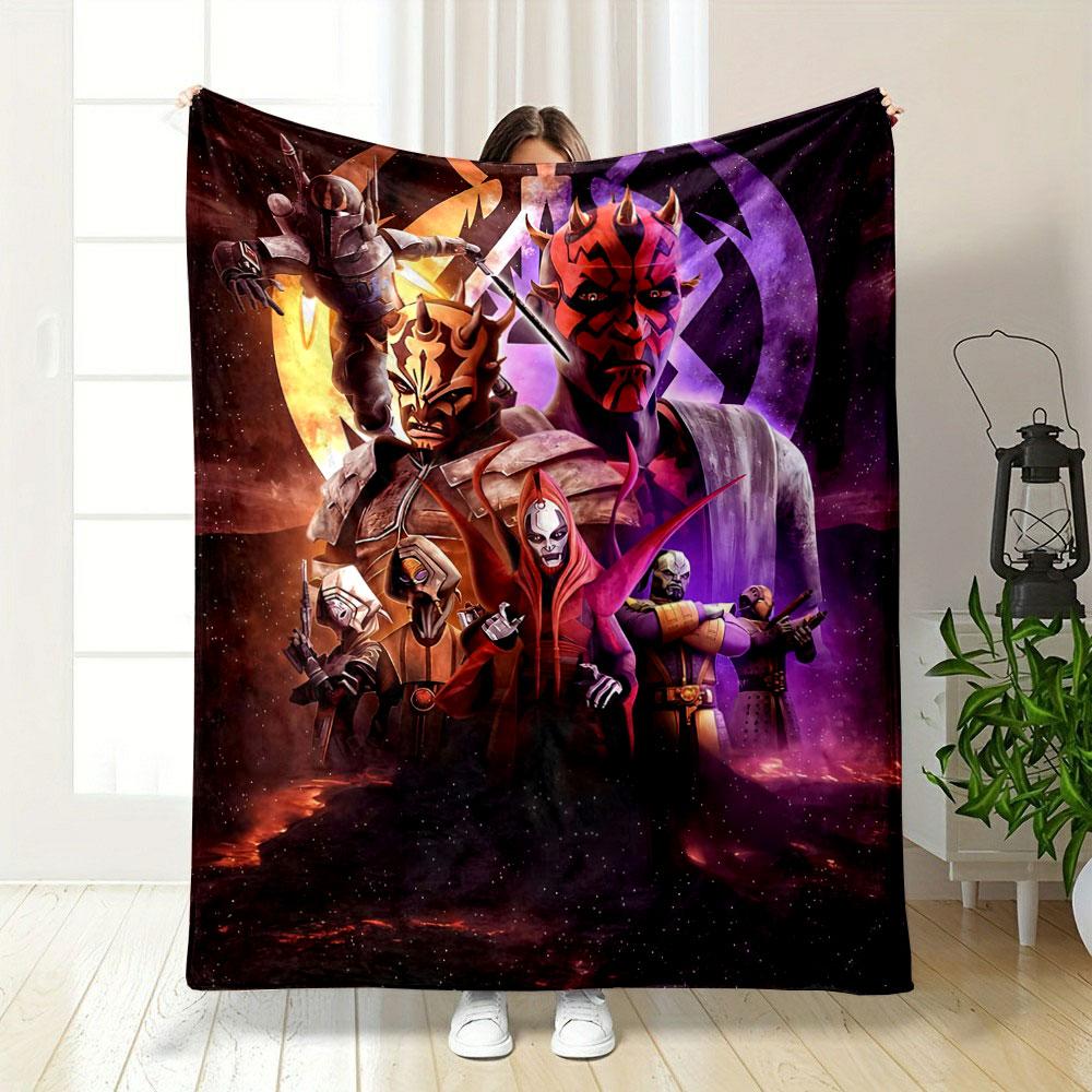 The pattern depicts dark, armored characters with glowing, ominous elements. for all seasons blanket lunch break throw gift