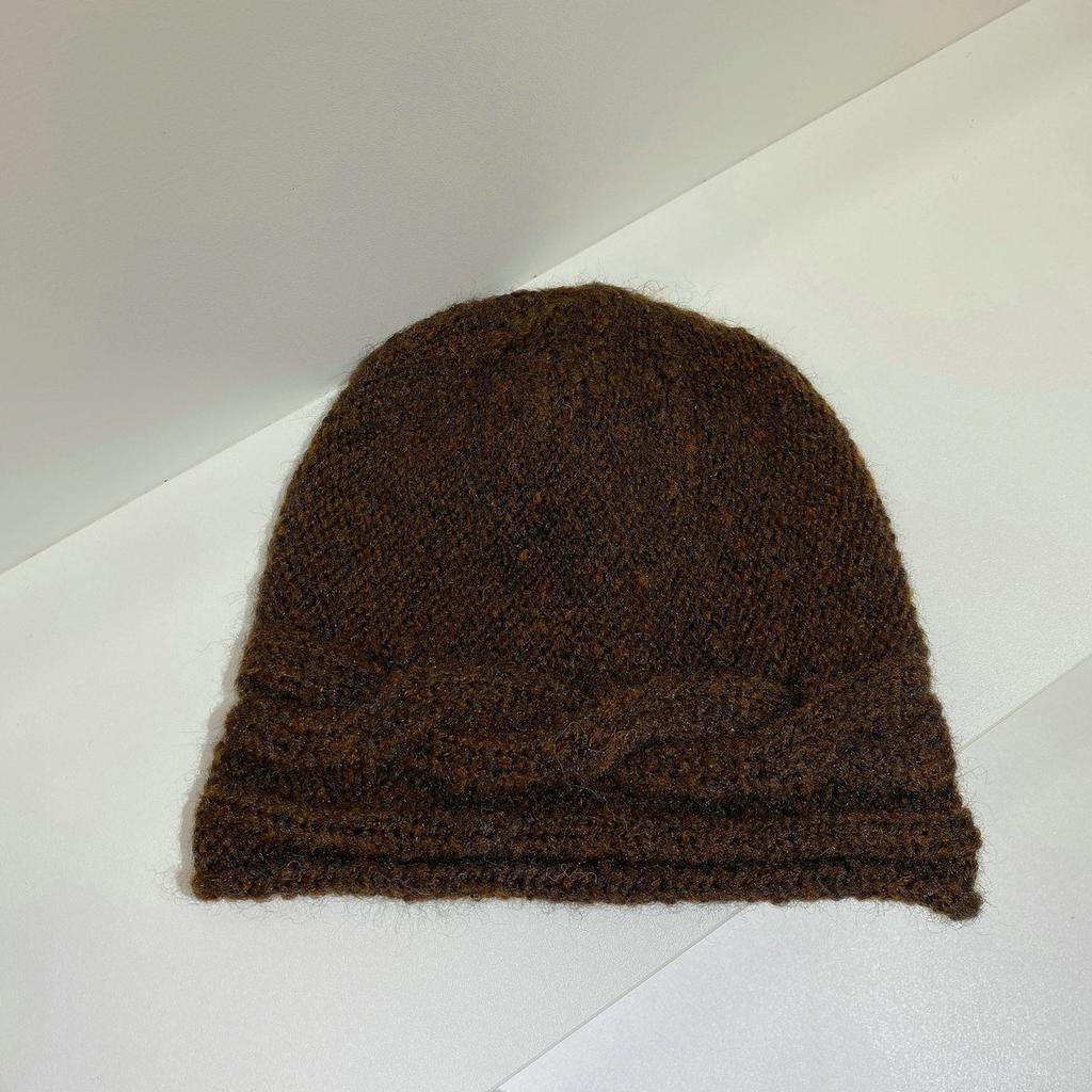 Knitted twist hat women's autumn and winter new ear protection warm wool hat versatile cover cold proof pile cold hat