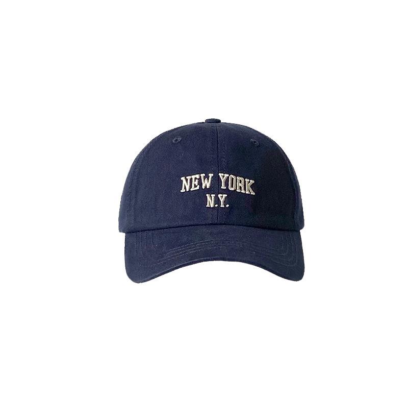 Female Baseball Cap Embroidered Soft Top Showing White Face with Small Navy Blue Baseball Cap for Women