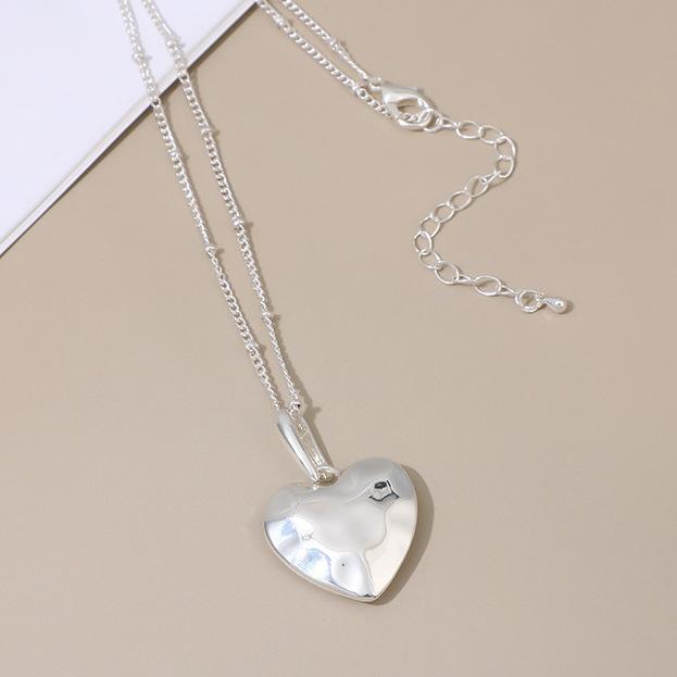 Hollow geometric flower love long necklace, women's exaggerated high-end irregular brushed pendant
