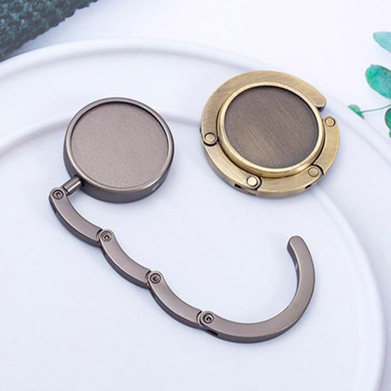 Faltbarer Taschenhaken mit Magnet, Anti-Rutsch-Design, vielseitige Kompatibilität, platzsparender Taschenhaken aus Metall, Handtaschenhalter