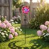Solar Powered Moon and Pinwheel Garden Stake Light with Metal Construction and Decorative Cutout Design for Outdoor Yard Pathway Lawn Landscape