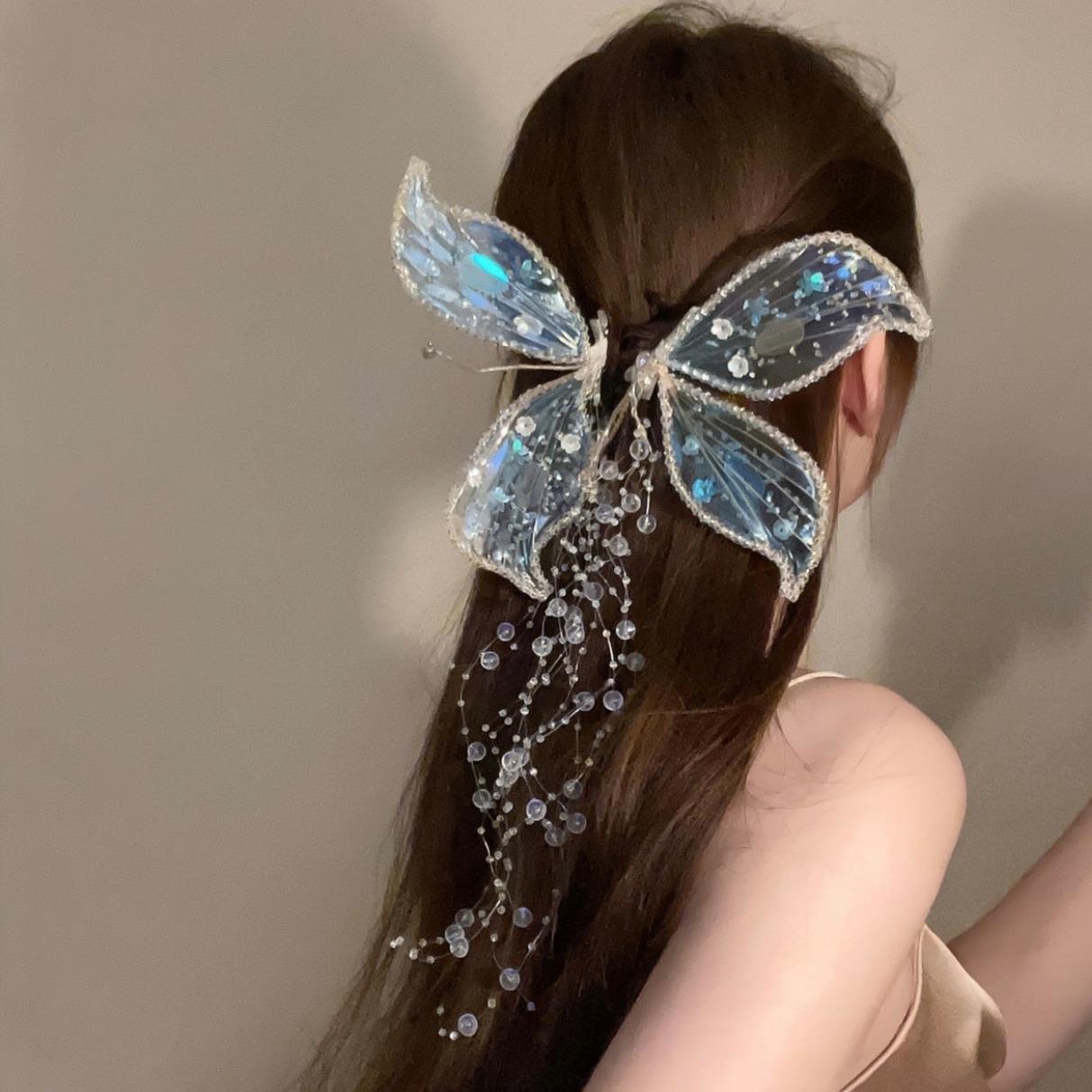 

Sequined Butterfly Crystal Hair Clip with Tassel and Flower Design