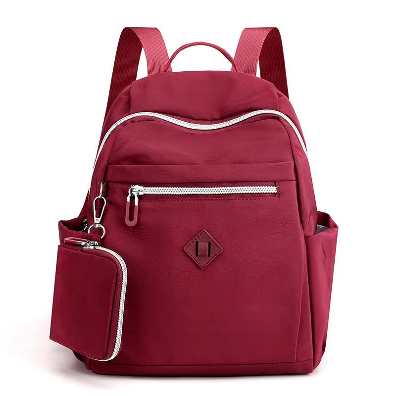 

Large capacity backpack women s fashion trend Korean version backpack anti-splashing travel bag couple schoolbag