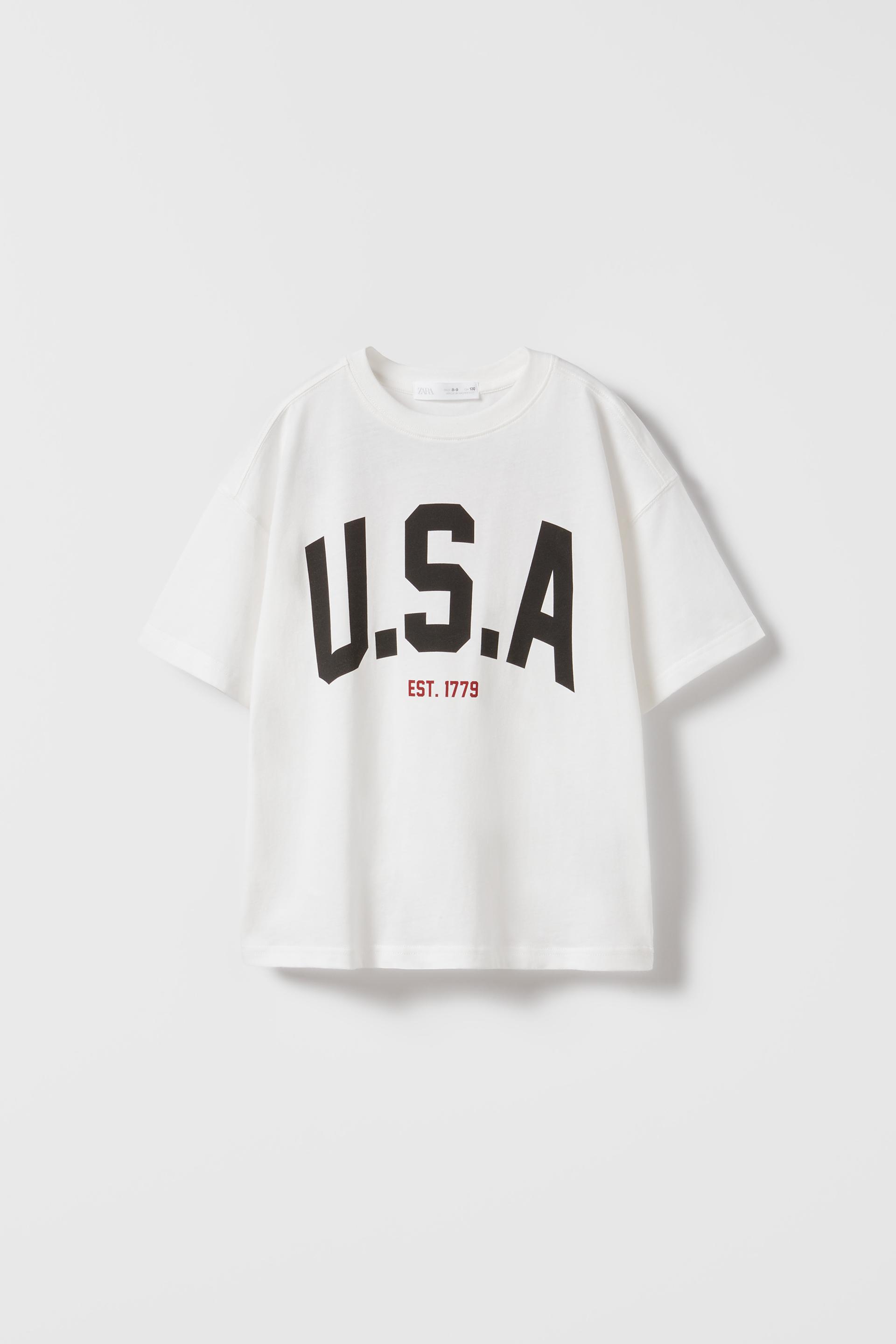

ФУТБОЛКА С ЛОЗГАНОМ США
