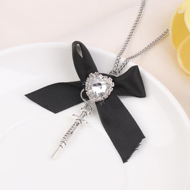 

Gothic Dark Lolita Syringe Pendant Necklace, Rhinestone Heart & Bowknot Design, Cool Fashion Jewelry Gift for Women чорний