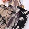 Mom's Summer Floral High-Waist Nine-Point Pants for Middle-Aged and Elderly Women - Elastic, Loose, and Casual Fit.