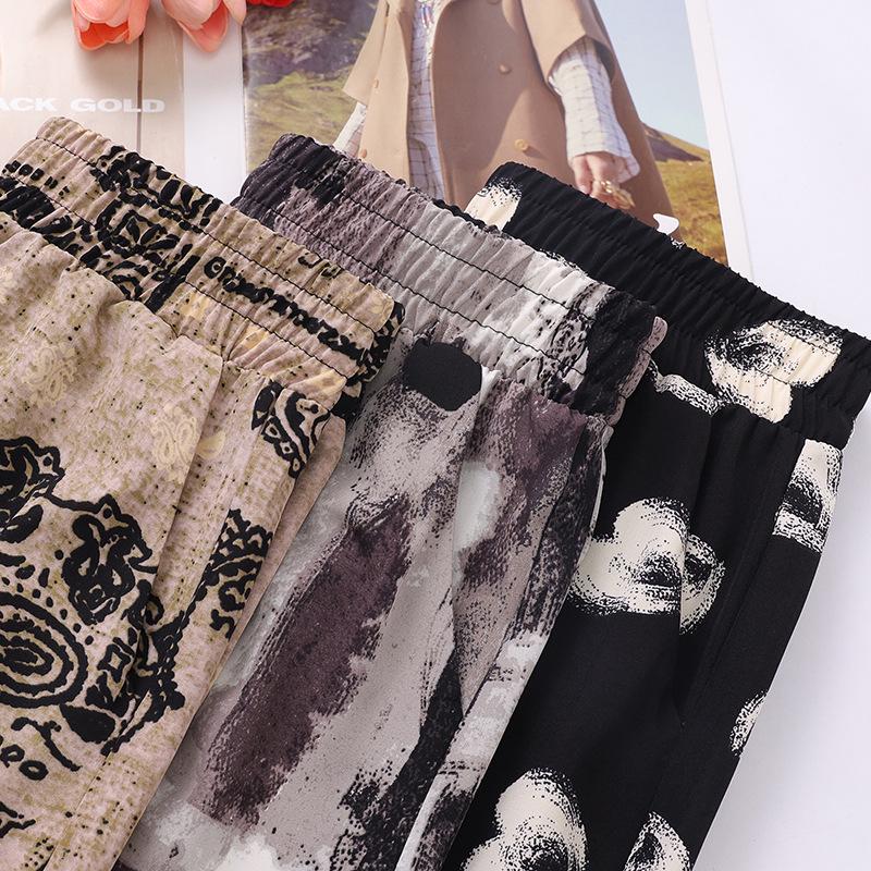 Mom's Summer Floral High-Waist Nine-Point Pants for Middle-Aged and Elderly Women - Elastic, Loose, and Casual Fit.