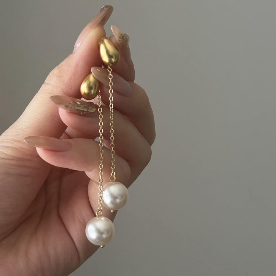 

Gentle super fairy temperament earrings light luxury high-end pearl earrings new high-end long fringed earrings women