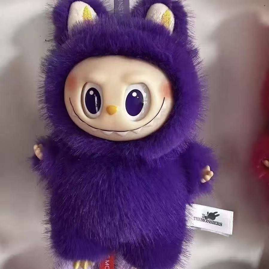 

Плюшевые игрушки Лабубу, модная и инновационная китайская версия с глазами-звездочками, глазами в форме сердца и глазами, создающими богатство, сделаны из виниловой ткани.