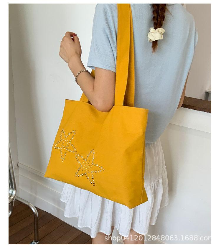

Large-capacity shopping bags, bags, women s 2025 casual literary and artistic portable canvas bags, simple and lightweight large single room tote bags жёлтый