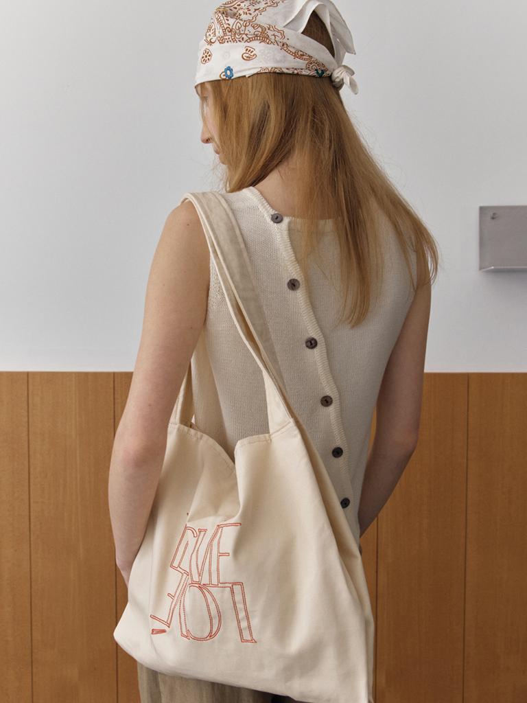 Elssibeui Diagonal Buttons Sleeveless Knit_Ivory