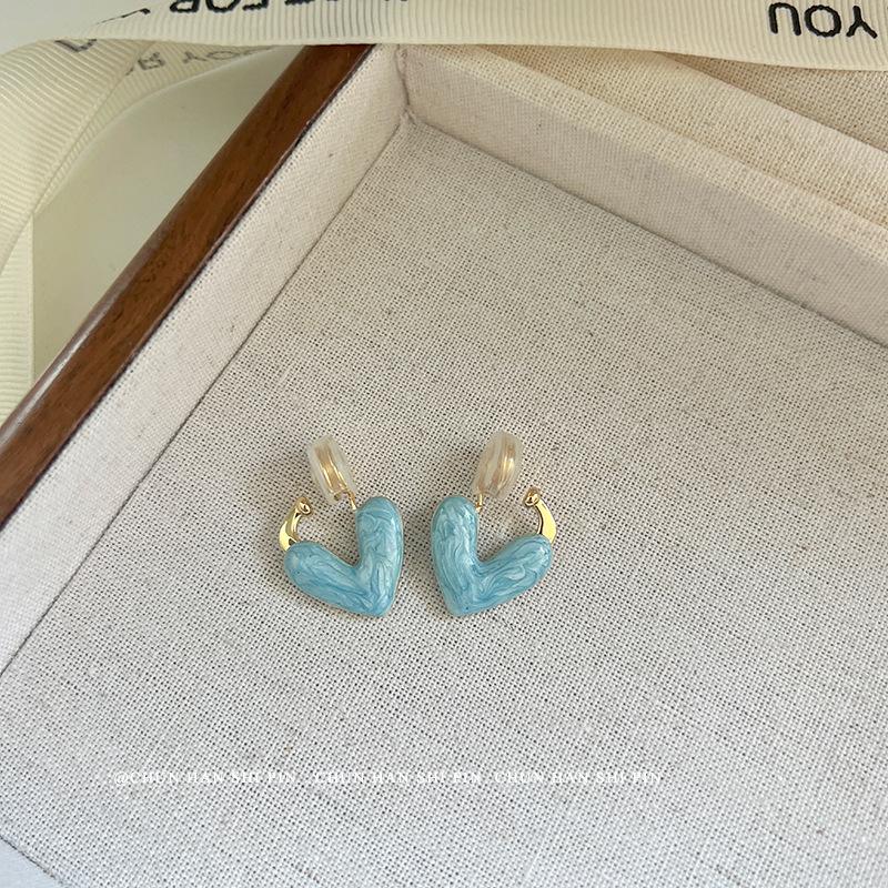 

Love drop glaze ear clips without ear holes, high-end niche design, light luxury mosquito coil disc earrings, spring and summer popular ear buckles