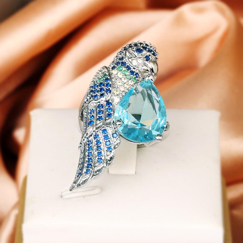 

Темперамент Мода Блестящий Синий Бриллиант Капля Воды Циркон Попугай Птица Личность Кольцо Девушка Вечеринка Подарок на День Рождения resizable