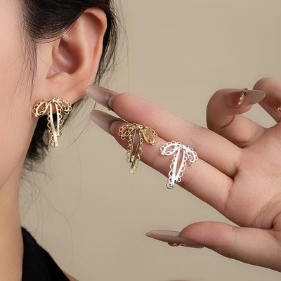 Cold Wind Hollow Bow Stud Earrings Women'S Simple Niche Design Temperament Versatile High-End Sense Ribbon Earrings Earrings
