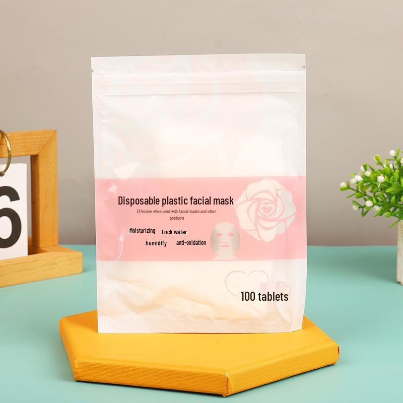 Aloe Vera Infused Disposable Plastic Mask Sheets - 100 Pieces for Moisturizing and Water-Locking in Beauty Salons