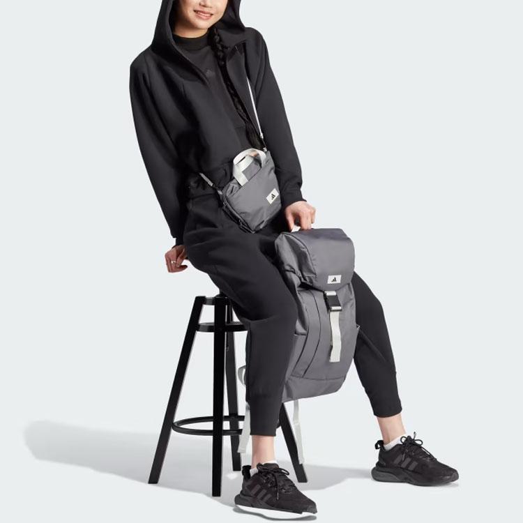 Adidas ZNE. Teplákové kalhoty s elastickými manžetami Dámské kalhoty Černé IN5136