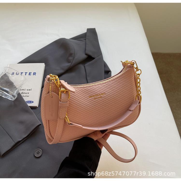 

New casual simple Korean woven underarm bag niche commuting versatile temperament solid color messenger women s bag