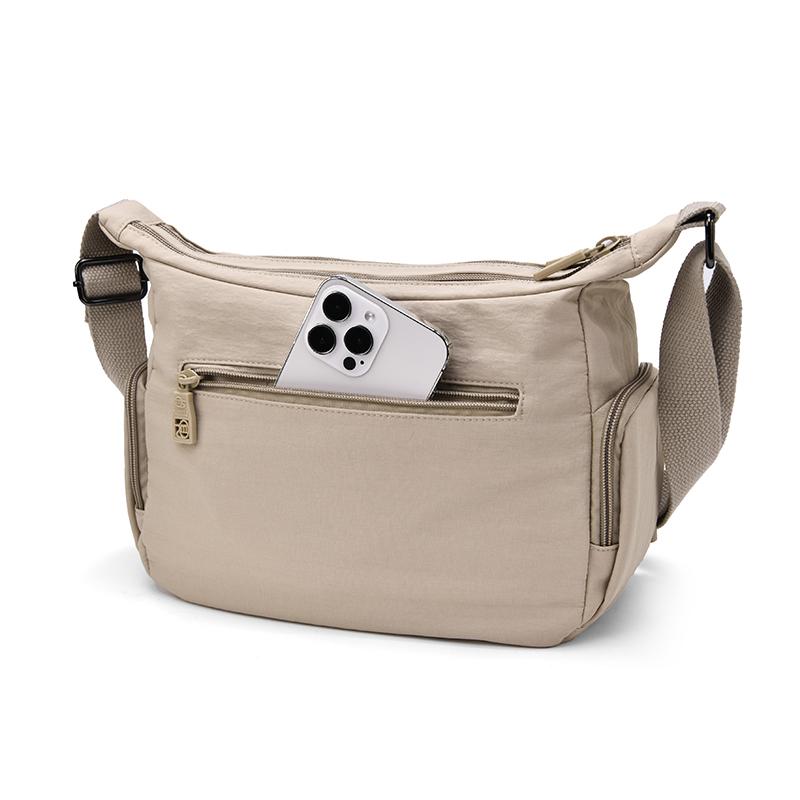 Fashionable Multi Pocket Crossbody Bag with Adjustable Strap and Spacious Design for Daily Use