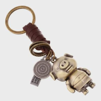 Gevlochten Leren Sleutelhanger voor Koppels met Cartoon Varkentje Hanger