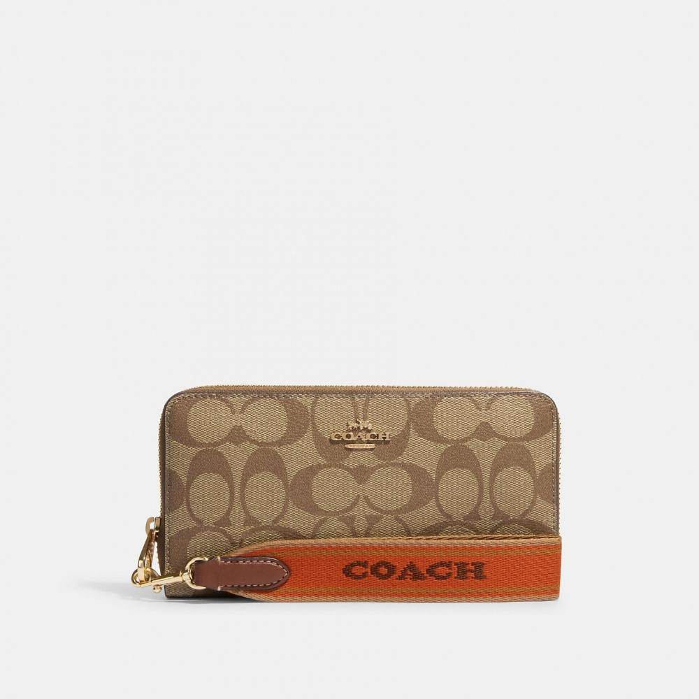 

Длинный кошелек Coach из фирменной канвы на молнии