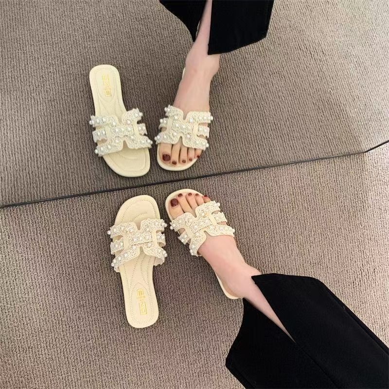 Lightweight pearl slippers female summer 2025 fairy style small fragrance explosion fashion flat bottom word beach cool slippers