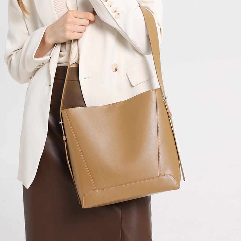Women's Cowhide Bag Versatile Commuting Bucket Bag 2025 New Genuine Leather Women's Bag High-End Niche Design Shoulder Bag