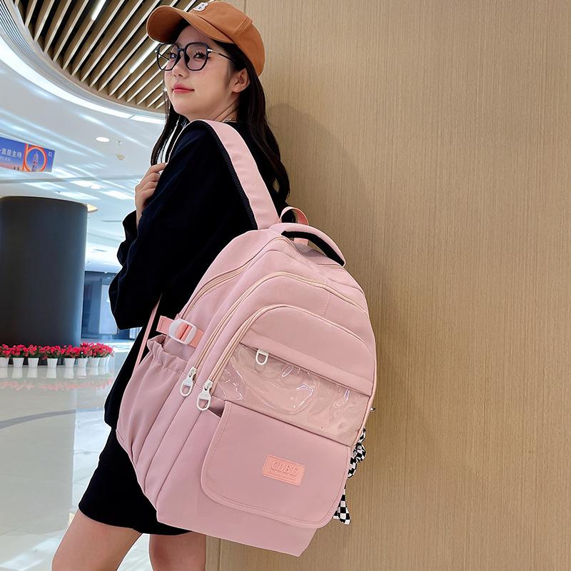 

Backpack women s new fashion junior high school student backpack large capacity lightweight casual high value schoolbag розовый