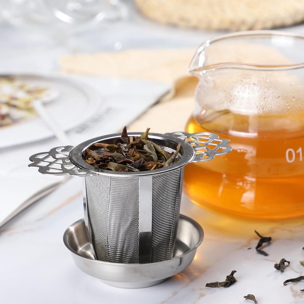 Stainless steel tea strainer with lid and teaspoon