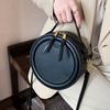 Dámska crossbody taška z PU kože monochromatická okrúhla malá taška dizajnérske tašky dámska taška cez rameno
