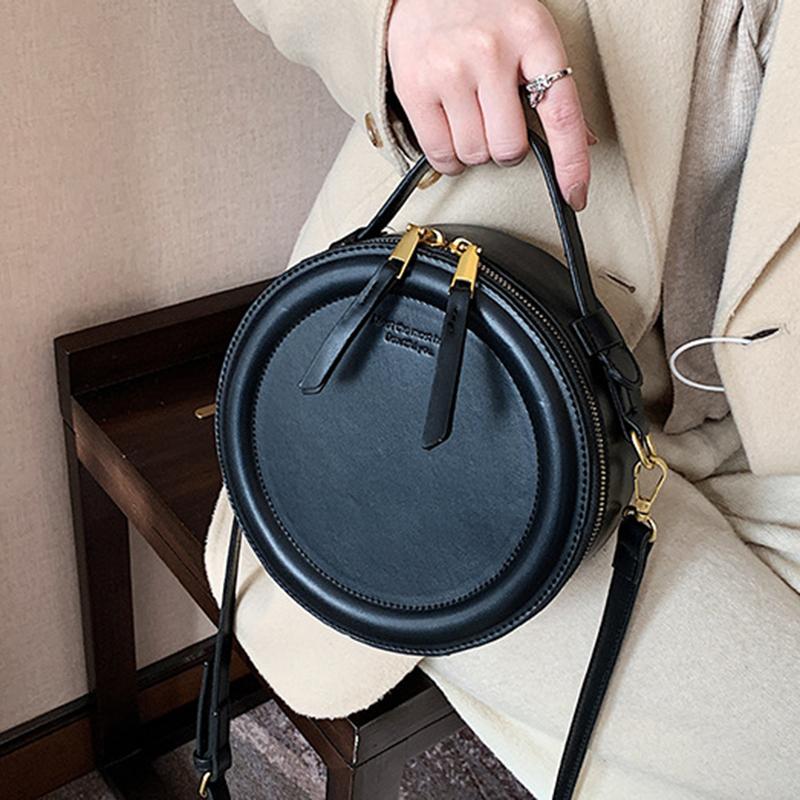 Dámska crossbody taška z PU kože monochromatická okrúhla malá taška dizajnérske tašky dámska taška cez rameno