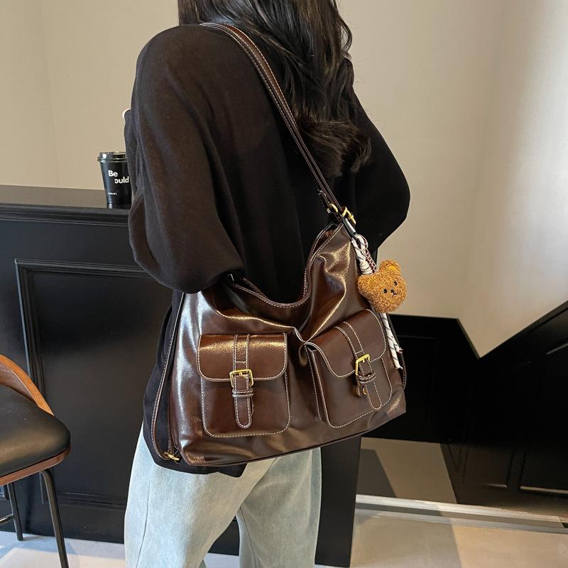 

Large capacity bag women s 2025 new locomotive multi-pocket single shoulder crossbody tote bag double shoulder rear backpack